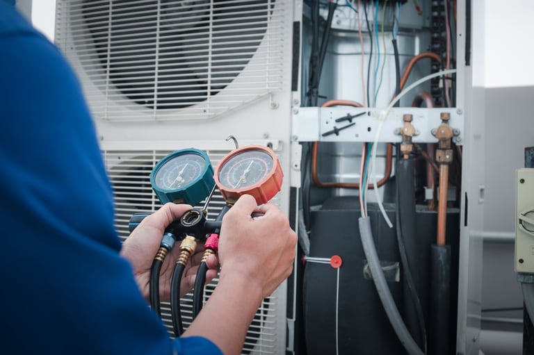 Technician is checking air conditioner